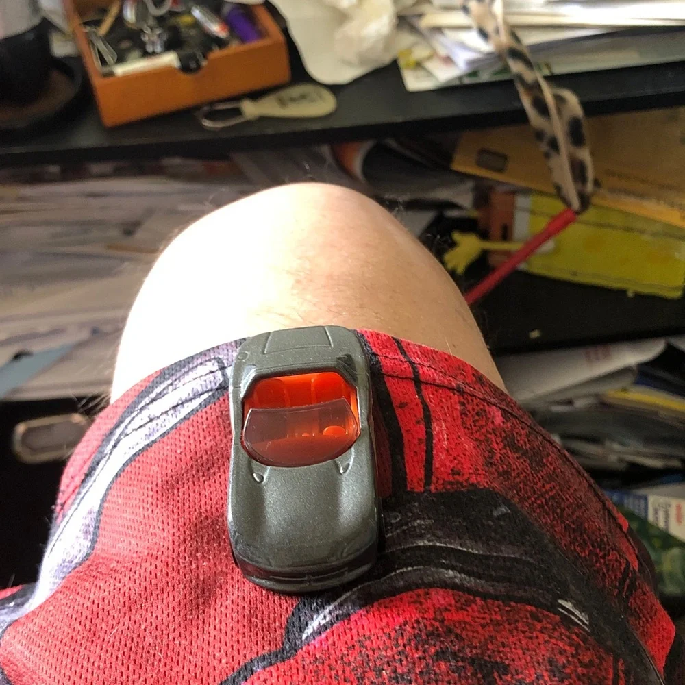 Small Gray Toy Car with Orange Interior